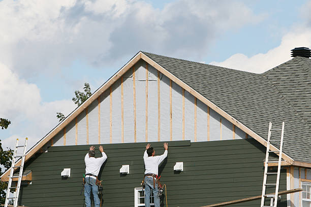 Professional Siding Installation technician working in Martinsburg, OH